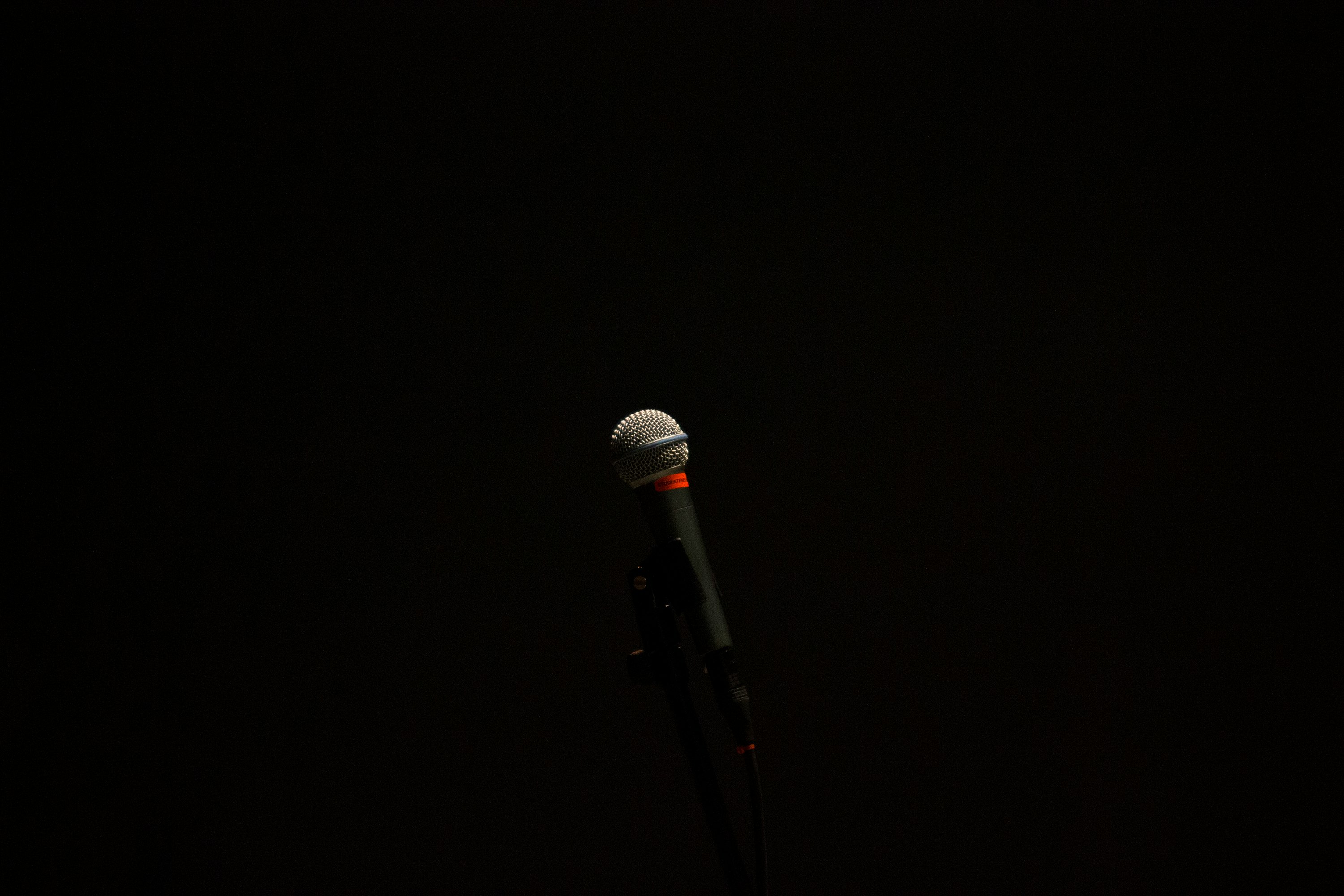 black corded microphone with stand